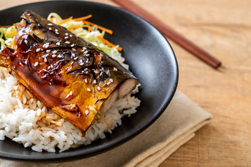saba fish grilled with teriyaki sauce on topped rice bowl