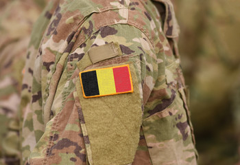 Flag of Belgium on soldiers arm (collage).