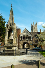 Picturesque old buildings around St Marys Gate near Gloucester Cathedral in spring sunshine,...