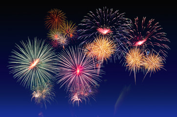 Fototapeta premium Fireworks celebration and the night sky background.