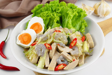Spicy cucumber salad with shrimp and pork sausage vietnamese style, Thai food