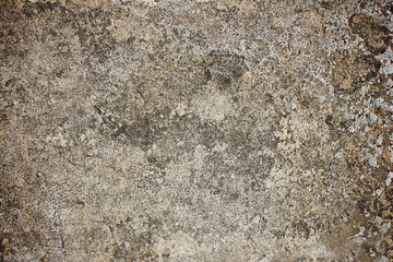 texture of an old gray concrete wall close-up in spots and scratches