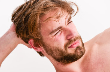 Obraz premium Man handsome bearded just wake up. Skin care and grooming. Morning beauty routine checklist. Essential practices beauty routine. Your beauty schedule. Macho attractive appearance care about beauty