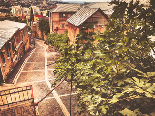 A breathtaking view of the old quarter of Tbilisi, the road leading down to the center of the city