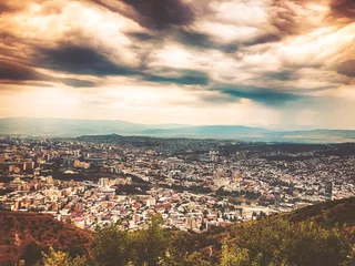 Foto op Canvas A breathtaking view of the city from the top of Mtatsminda Park on the funicular in Tbilisi © Victoria Key