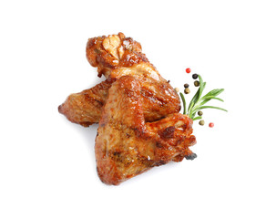 Delicious barbecued chicken wings on white background, top view