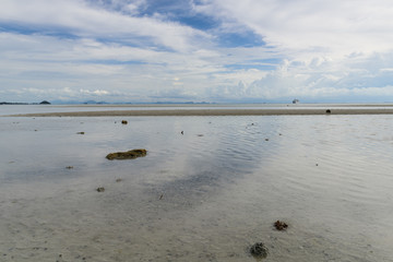 White beach and blue sky background