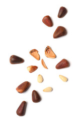 Obraz premium Composition with pine nuts on white background, top view