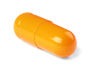 Pill on white background. Medical care and treatment