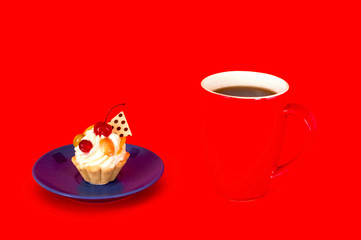 Big red cup of coffee and cupcake with cherry on background of c