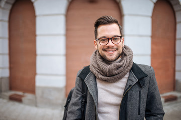 Portrait of a hipster man in outdoors in the city.