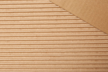 Cardboard as background, top view with space for text. Recyclable material