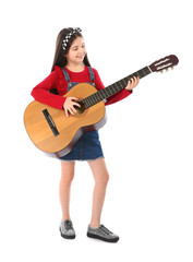 Obraz premium Little cheerful girl playing guitar, isolated on white