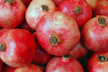 Group of pomegranates. Pomegranate closeup, background