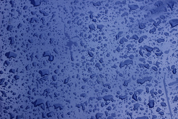Rain droplets drops wet car blue black hood surface texture