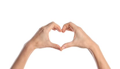 Woman making heart with her hands on white background, closeup