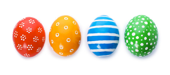 Decorated Easter eggs on white background, top view. Festive tradition
