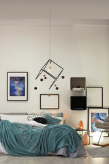 Stylish room interior with comfortable bed and decor