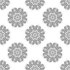 Fototapeta premium Floral vector ornament. Seamless abstract classic background with silver flowers. Pattern with repeating floral elements. Ornament for fabric, wallpaper and packaging