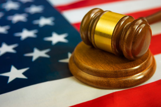 the judge's gavel, American flag. legislation, law, justice.