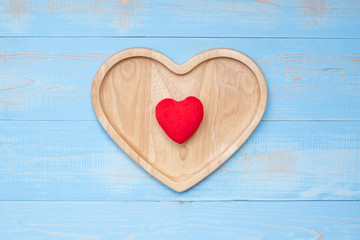 Top view couple heart shape  on blue pastel wooden table. love, romantic and Valentine Day holiday Concept