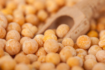Dry dry peas in the wooden spoon, healty food