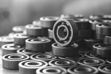 Machinery concept. Set of various gears and ball bearings old and new, BW, black and white