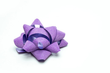 violet bow on a white background