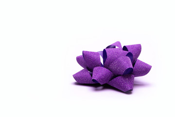 violet bow on a white background