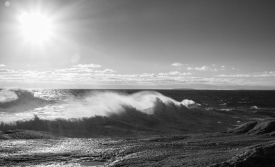 Winter waves at Peggy's Cove in Nova Scotia during sunset, peaceful, waves, powerful.