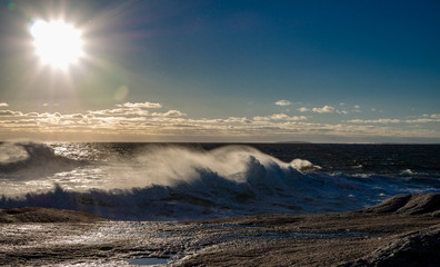 Winter waves at Peggy's Cove in Nova Scotia during sunset, peaceful, waves, powerful.