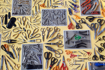 a lot of scissors on the table © Anna