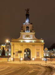 
    Branicki Palace in Bialystok in Poland at night in winter scenery. The entrance gate to the palace. 