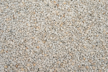 White small rocks or stones surface texture, industrial gravel mineral material, background for design as backdrop