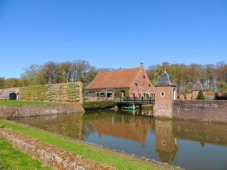 Fototapeta na wymiar The historic castle of Menkemaborg in Netherlands