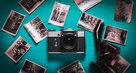 Old vintage camera with old photos
