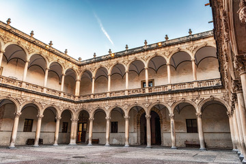 Fototapeta na wymiar View of cloisters of historic Santo Domingo monastery and school in Orihuela, Spain.