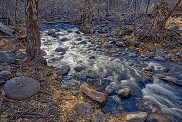 Rushing water of Oak Creek beneath Midgley Bridge near Sedona Arizona.