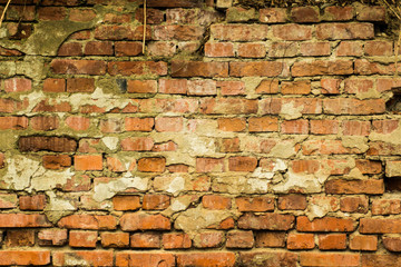 Vintage brick wall. Empty background of brickwork. Sturdy brickwork textured rough surface.