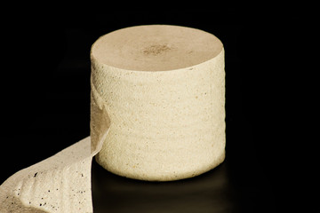 Simple toilet paper on black background