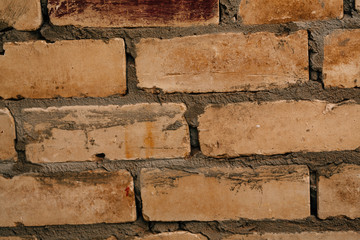 dark orange beige brick with cement close-up