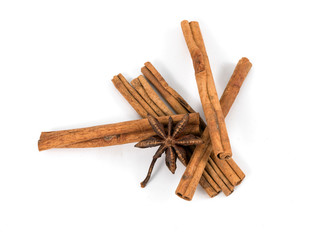 Cinnamon stick and star anise spice isolated on white background closeup