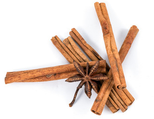 Cinnamon stick and star anise spice isolated on white background closeup