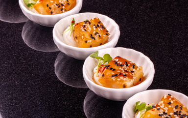 A halibut caramelized with sesame and oil