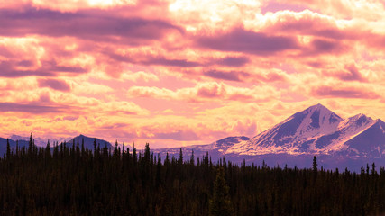 Alaska pink mountain sunset over Rockies