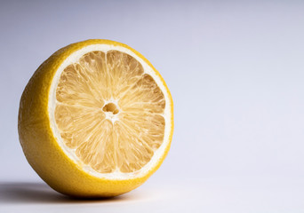 Lemon. Fresh lemon isolated on white. Lemon in a cut