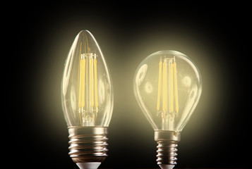 Silhouette led lamps against the background of the silhouette of the layout of the house on a...