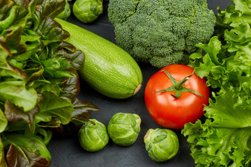 Group of fresh vegetables and lettuce close-up. the view from the top. set of fresh vegetables. healthy, natural products.