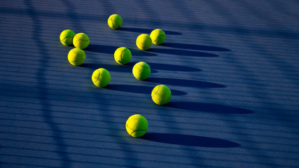 Tennis game. Tennis balls on the tennis court. Sport, recreation concept 