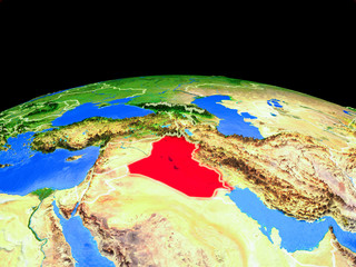 Iraq on model of planet Earth with country borders and very detailed planet surface.